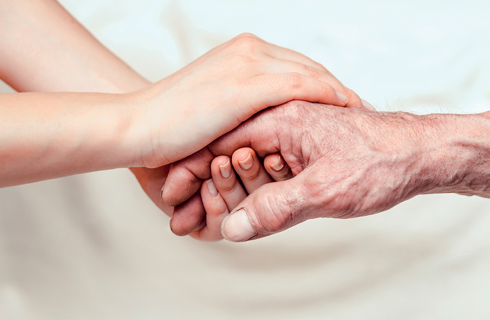 holding elders hand